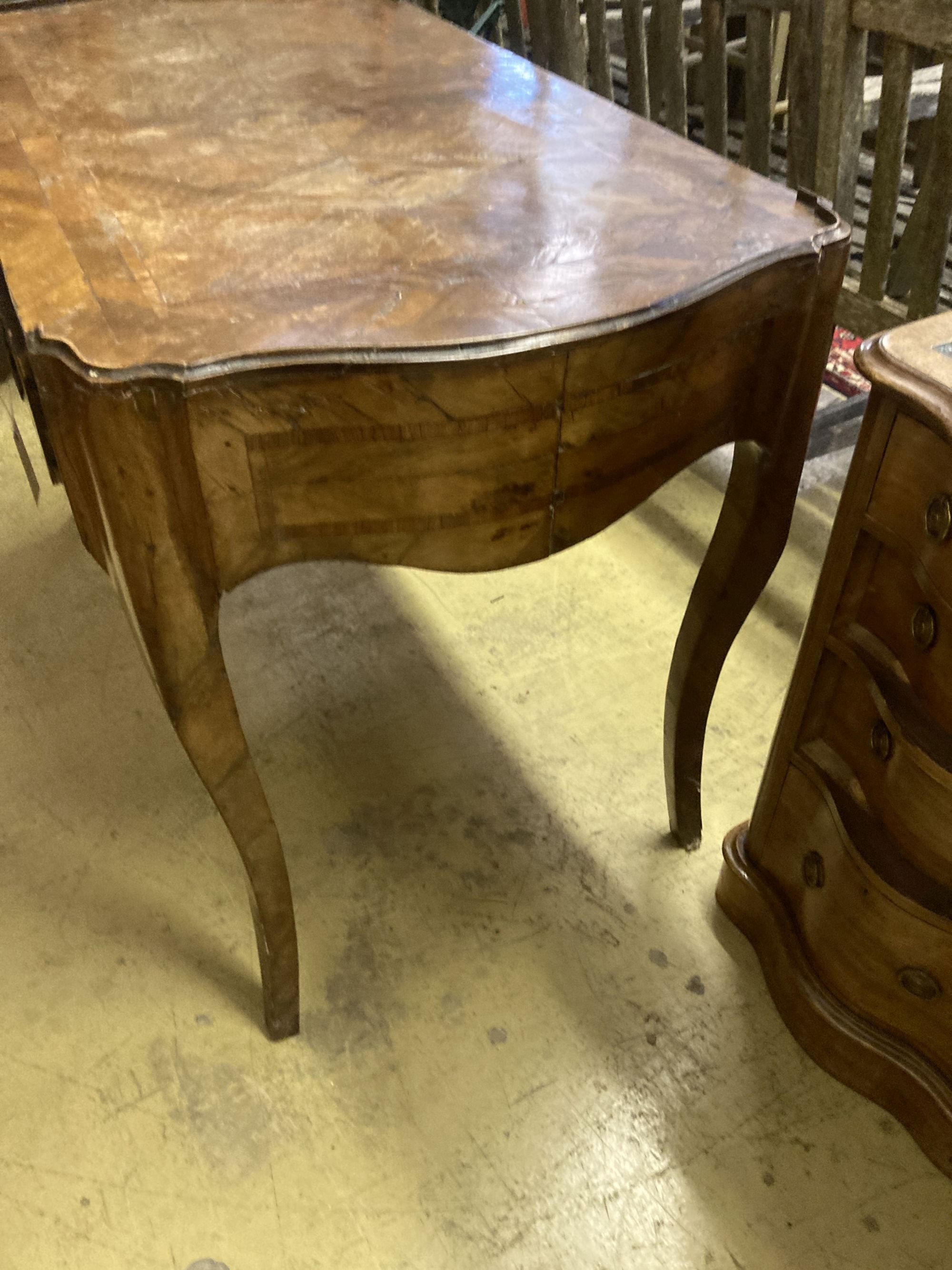 A Louis XV kingwood veneered side table, fitted one long drawer (requiring restoration), width 118cm, depth 63cm, height 79cm